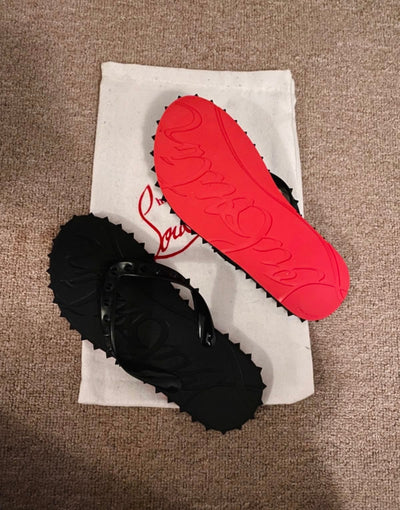 Rote Sohle Flip Flops Schwarz